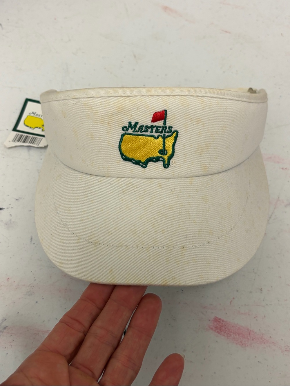 American Needle White Visor with Yellow and Green Logo